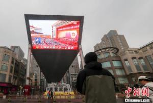 （两会观察）中国密集释政策信号提振信心